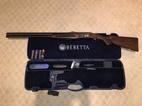 Beretta shotgun and accessory basket 202//152