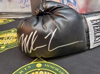 Autographed boxing glove of Iron Mike Tyson. 202//151