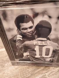 Picture of Mohamed Ali with soccer star Pele. Signed by Pele 202//269