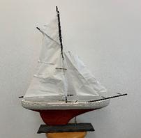 Primitive style hand crafted wooden sailboat, 32