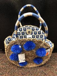 Mud Pie straw bag w/blue pom poms lined inside w/Jesuit shield fabric 202//269