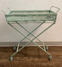 Mint-green rolling bar cart with tray top. 26