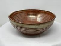 Copper colored ceramic bowl with carved lines 202//152