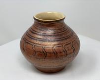 Copper colored carved ceramic pot with white interior 202//162