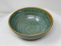 Aqua textured with honey mustard trim ceramic bowl 202//152