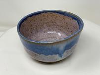 Mauve Speckled ceramic bowl with icicle blue trim 202//152