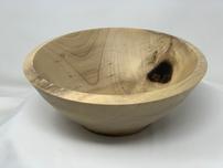 Blonde wooden bowl with distinctive tree characteristics 202//152