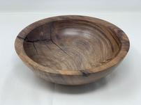 Dark wooden bowl with black accent grain 202//151
