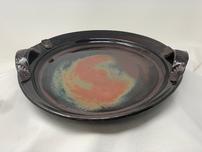 Large ceramic platter in shades of black , copper & green 202//152