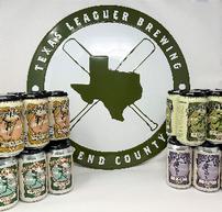Four 6-packs of Texas Leaguer beer and a tin tacker sign 202//193
