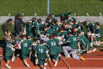 Lacrosse team kneeling for prayer 202//135